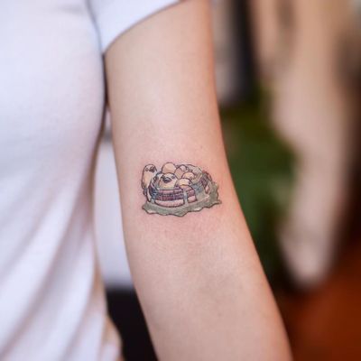 Today's favorite tattoo by Arles Tattoo #ArlesTattoo #favoritetattoos #favorite #besttattoos #tattooideas #newtattoo #tattooinspiration #cooltattoos #tattoodoapp #studioghibli #ducks #cute #anime #arm