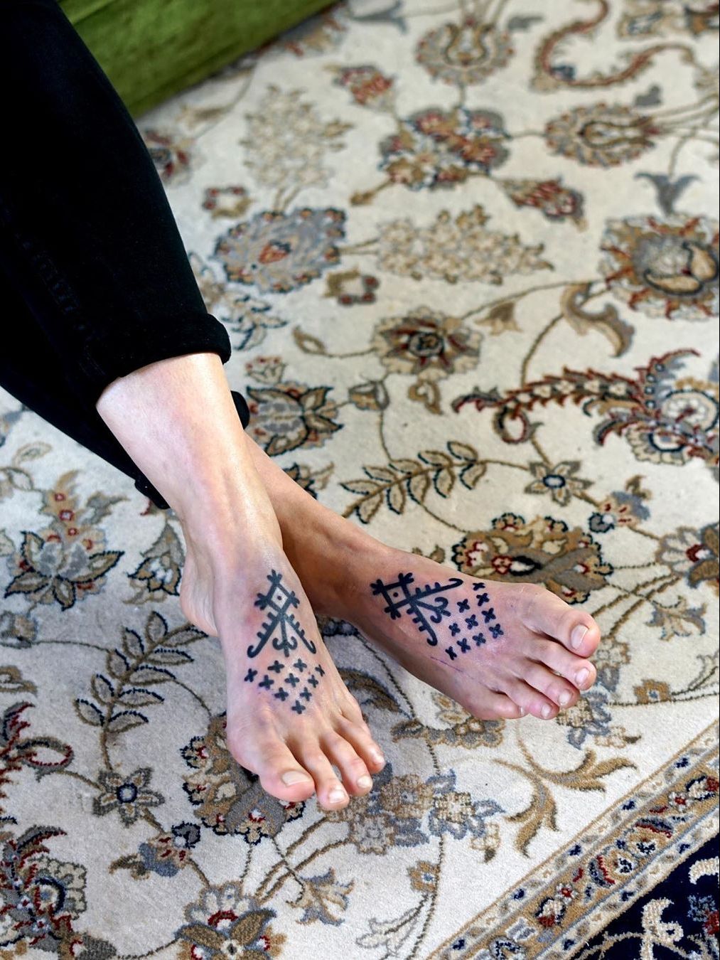 Stars And Tribal Women Foot Tattoo