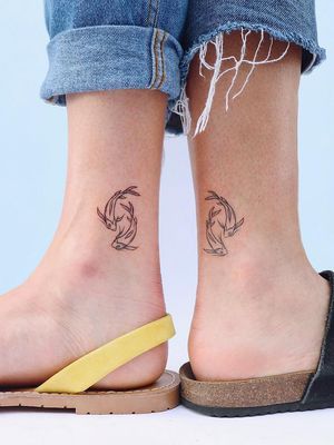 Matching best friend tattoos by Zaya #Zaya #bestfriendtattoos #friendshiptattoos #friendtattoos #bfftattoo #matchingfriendtattoos #illustrative #linework #fish #koi #ankle