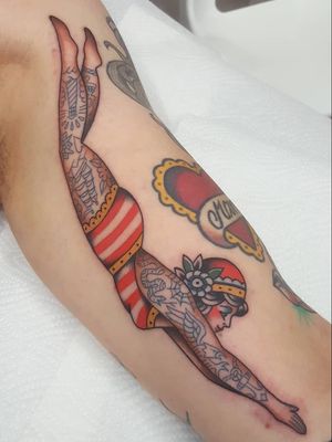 Pinup tattoo by Nikko Barber aka nikkotattooer #NikkoBarber #Nikkotattooer #Berlintattoo #tattooBerlin #traditional #AmericanTraditional #color #oldschool #lady #tattooedtattoo #eagle #snake #ship #pinup