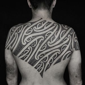 Tribal back tattoo by Manawa Tapu #ManwaTapu #blackwork #tribal #tribaltattoo #tamoko #maori #polynesian #linework #pattern #backtattoo #backpiece