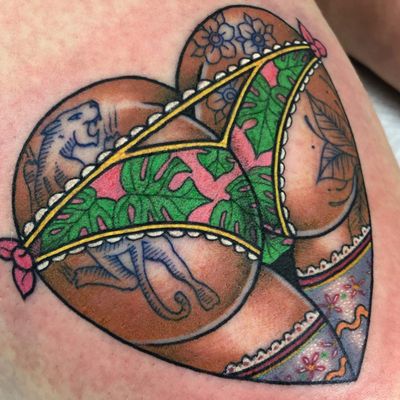 Heart tattoo by Guen Douglas #GuenDouglas #hearttatotos #hearttattoo #hearts #heart #love #panther #flower #floral #neotraditional #color #leg #bum #pinup