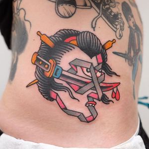 Surreal Japanese tattoo by Dan Moreno #DanMoreno #TattoodoApp #tattooartist #tattooart #tattooidea #inspiringtattoo #besttattoo #awesometattoo #side #ribs #geisha #Japanese #abstract #dagger