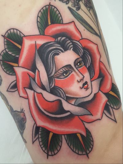 Rose tattoo by Nikko Barber aka nikkotattooer #NikkoBarber #Nikkotattooer #Berlintattoo #tattooBerlin #traditional #AmericanTraditional #color #oldschool #rose #ladyhead #flower