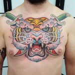 Tiger tattoo by Nikko Barber aka nikkotattooer #NikkoBarber #Nikkotattooer #Berlintattoo #tattooBerlin #traditional #AmericanTraditional #color #oldschool #tiger #junglecat #sword #dagger #chesttattoo