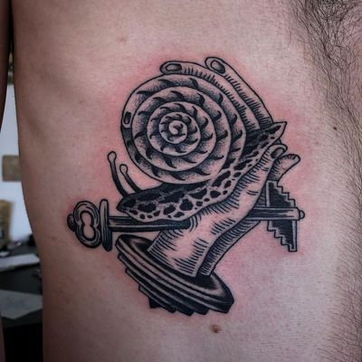 Snail tattoo by Franco Maldonado #FrancoMaldonado #snailtattoo #snailtattoos #snail #nature #animal #blackwork #key #hand #surreal #surrealism #darkart #linework