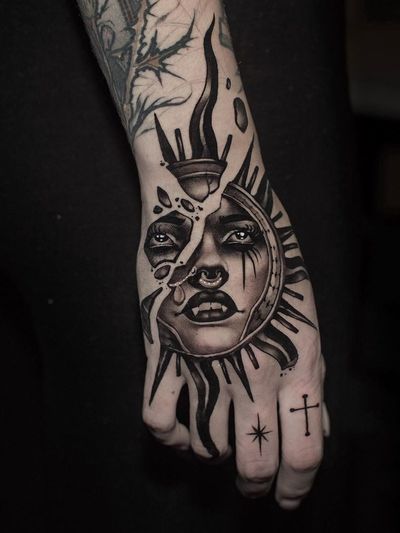 Hand tattoo by Cristian Casas #CristianCasas #LondonTattooConvention #LondonTattooConvention2019 #London #tattooconvention #neotraditional #sun #moon #vampire #pearls #star #shattered #cross #hand