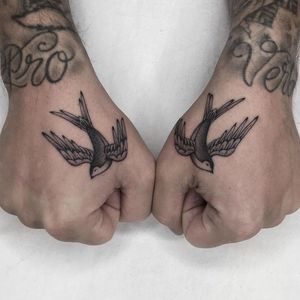 Hand tattoos by Diego Prieto aka Illegal Tattoos #DiegoPrieto #IllegalTattoos #TattoodoApp #tattooartist #tattooart #tattooidea #inspiringtattoo #besttattoo #awesometattoo #handtattoo #swallowtattoo #bird #wings
