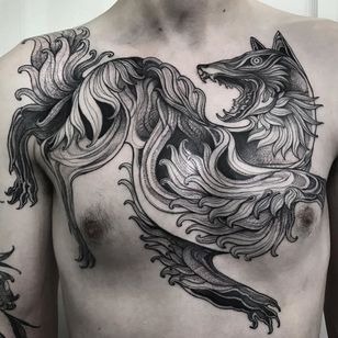 Tattoo by Nomi Chi #illustrativetattoos #illustative #dotwork #dog #wolf #fox #chest #blackwork