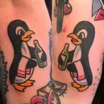 Best Friend Tattoos for Guys by Beau Adams #BeauAdams #bestfriendtattoos #friendshiptattoos #friendtattoos #bfftattoo #matchingfriendtattoos #penguins #traditional