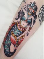 Mermaid tattoo by Nikko Barber aka nikkotattooer #NikkoBarber #Nikkotattooer #Berlintattoo #tattooBerlin #traditional #AmericanTraditional #color #oldschool #mermaid #pearls #ocean #fish #scales #lady #pinup