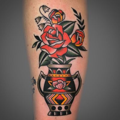 Flower vase tattoo by Jeff Gleason #JeffGleason #TattoodoApp #tattooartist #tattooart #tattooidea #inspiringtattoo #besttattoo #awesometattoo #color #traditional #rose #flower #floral #vase #leg