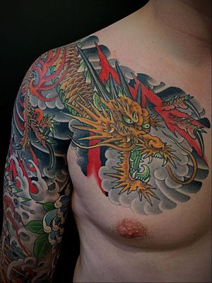 Japanese tattoo by Matt Beckerich #MattBeckerich #tattooideas #tattooidea #tattooinspiration #tattoodesign #tattoodesignidea #tattooinspo #Japanese #dragon #chest #sleeve #chrysanthemum #waves #irezumi #japanesetattoo