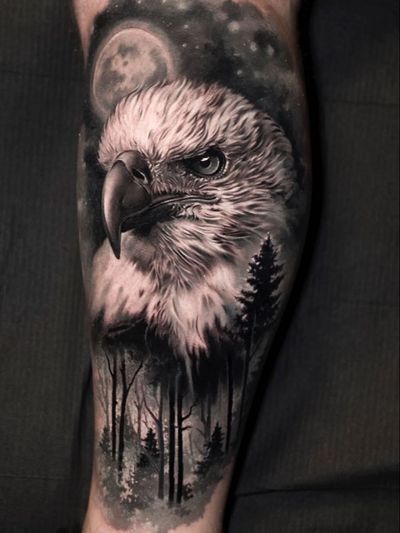 Eagle tattoo by Jose Contreras #josecontreras #tattooideas #tattooidea #tattooinspiration #tattoodesign #tattoodesignidea #tattooinspo #blackandgrey #realism #realistic #hyperrealism #eagle #feathers #forest #bird