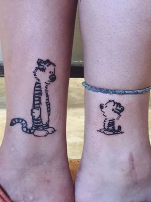 Matching best friend tattoos by Jess Judah #JessJudah #bestfriendtattoos #friendshiptattoos #friendtattoos #bfftattoo #matchingfriendtattoos #calvinandhobbes #cartoon #illustrative #cute
