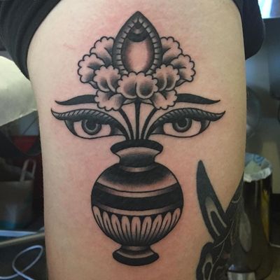 Buddhist tattoo by Joel Melrose #JoelMelrose #buddhisttattoo #buddhatattoo #buddhism #buddha #enlightenment #meditation #easternreligion #conch #shell #buddhaeye #vase #flower #traditional