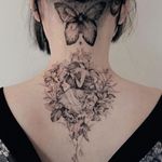 Fineline tattoo by Zihwa #Zihwa #besttimetogettattooed #gettattooed #winter #besttattoos #fineline #illustrative #angel #girl #flowers #floral #plants #Butterfly #linework #blackandgrey #neck #back