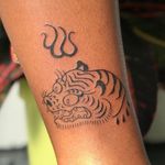 Tiger tattoo by Gossamer aka Grelysian #Gossamer #Grelysian #nationalcomingoutday #queer #qttr #lgbt #lgbtqia #blackwork #tiger #fire #linework #illustrative
