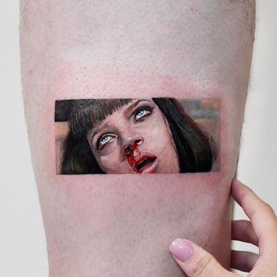 Pulp Fiction tattoo by Edit Paints #EditPaints #besttimetogettattooed #gettattooed #winter #besttattoos #pulpfiction #umathruman #movietattoo #legtattoo #color #realism #hyperrealism #portrait #ladyhead