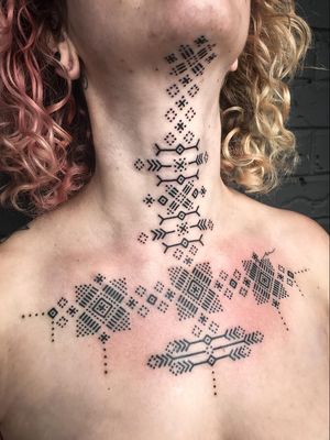 Intricate pattern tattoo by Barnsey Tattoo #Barnsey #BarnseyTattoo #nationalcomingoutday #queer #qttr #lgbt #lgbtqia #dotwork #linework #pattern #blackwork #shapes #folkart #necktattoo #chesttattoo