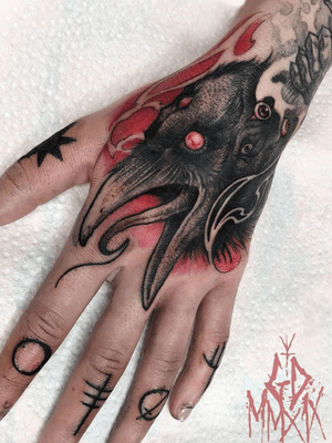Crow hand tattoo by Rob Borbas #RobBorbas #Halloweentattoos #halloweentattoo #halloween #Samhain #AllHallowsEve #crow #darkart #illustrative #fingertattoos #sigils #bird #demon 