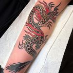 Dragon tattoo by Paul Dobleman #PaulDobleman #besttimetogettattooed #gettattooed #winter #besttattoos #japanese #dragon #arm #color #traditional #mashup