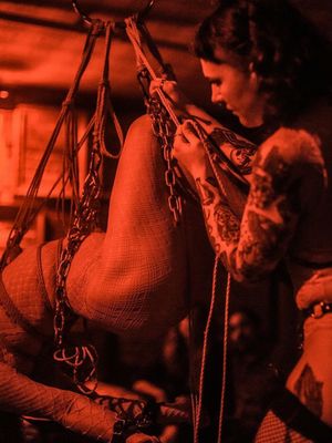 moralathletics being tied by Daemonum X photographed by Tiffany Rexach #DaemonumX #tattoocollector #leatherdyke #ropetop #shibari 