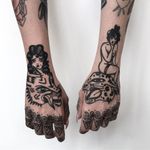 Blackwork tattoo by Monki Diamond #MonkiDiamond #blackwork #illustrative #handtattoos #hands #lady #wolf #cat #junglecat #leopard