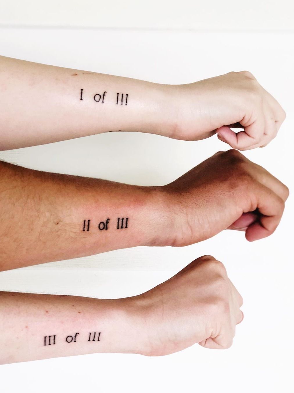 Tattoo uploaded by Justine Morrow • Sibling tattoo for 3 by unknown artist  #sistertattoos #sisters #sistertattooidea #familytattoo #siblingtattoo  #matchingtattoo #bfftattoo #siblingtattoofor3 #3matchingtattoos  #romannumerals #numbers #minimal #simple ...