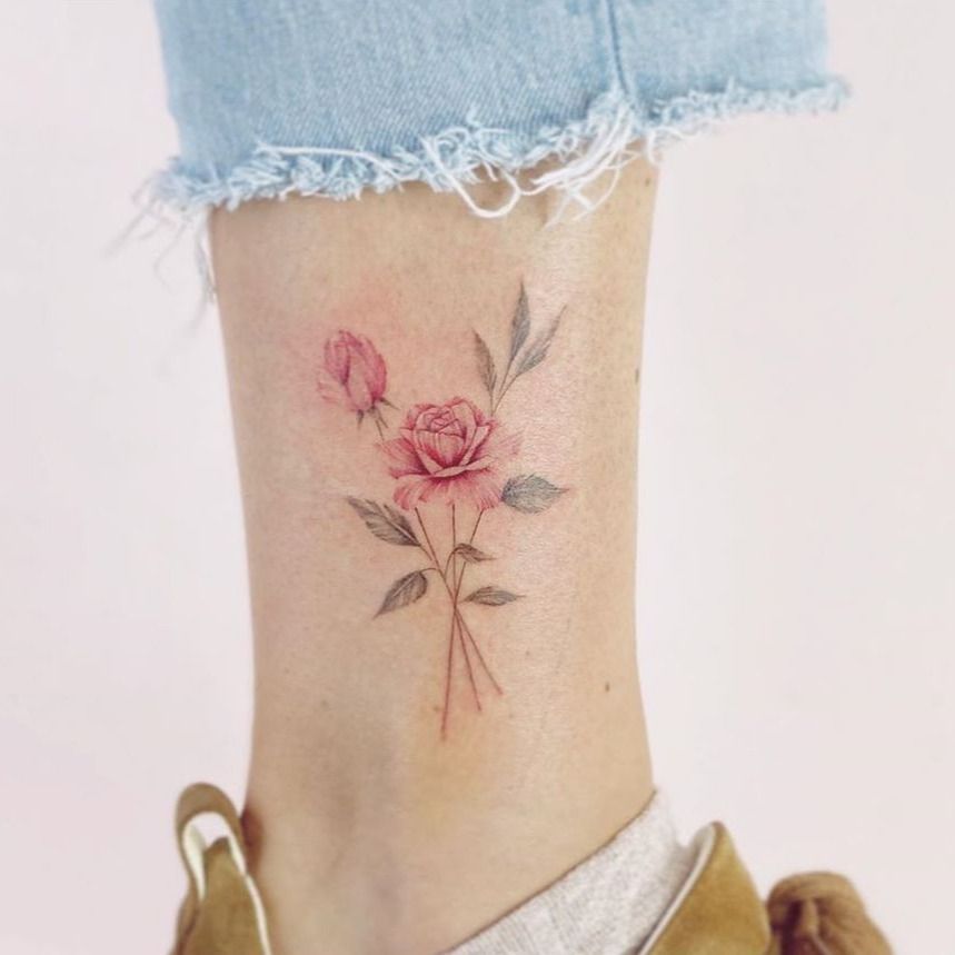 Tiny rose tattoo by Mallory Swinchock TattooNOW