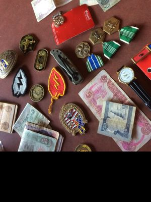 Jeremy's collection of items from his days as a soldier - photos by Justine #WarPaint #VeteranTattoos