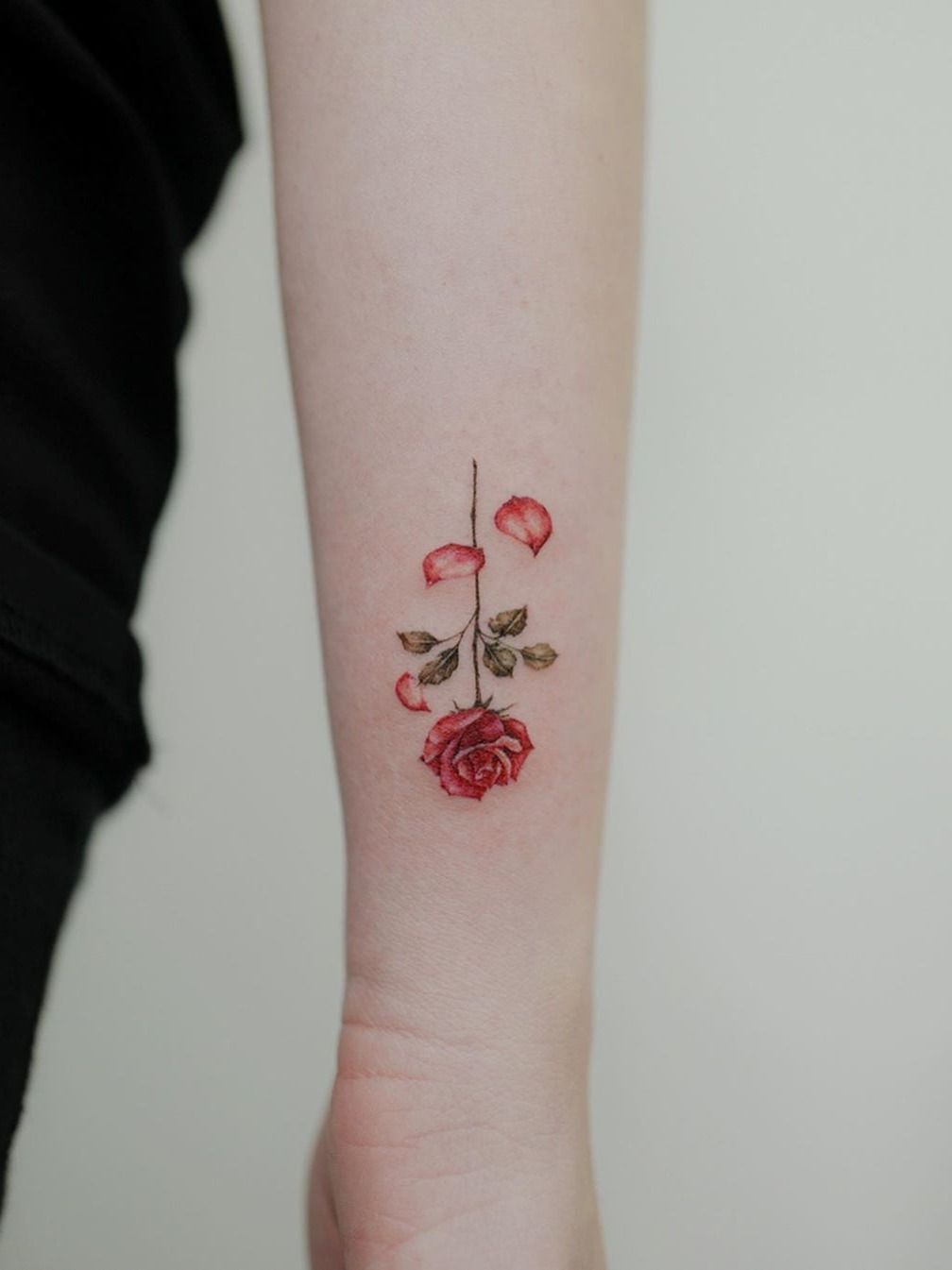 Falling petals  Rose tattoos Rose tattoo design Cover up tattoos