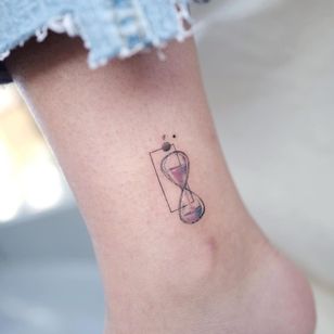 hourglass tattoo by tattooist basil #tattooistbasil #hourglass #fineline #tinytattoo #smalltattoo #ankletattoo