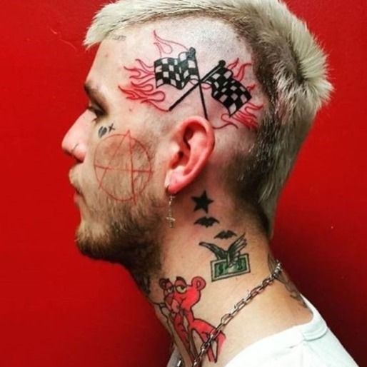 2KBaby Announces Scared 2 Luv Album with Gruesome Forehead Tattoo