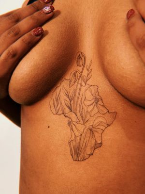 Africa tattoo by Jade Chanel #JadeChanel #africa #sternumtattoo #floral #plants #illustrative #Linework #tattoosondarkskin #darkskintattoos