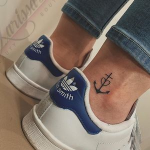 Simple anchor with heart design by Larissa M. of Tattoo Boutique Larissa #LarissaM #smalltattoo #anchortattoo #blackwork #heart #minimalist #ankletattoo #MeaningfulTattoo