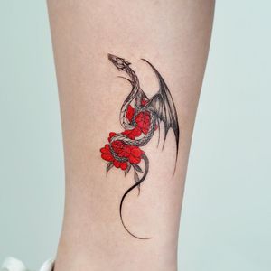 Dragon tattoo by Bium Tattoo #Biumtattoo #flowers #illustrative #fineline #dragontattoos #dragontattoo #dragon #mythicalcreature #myth #legend #magic #fable