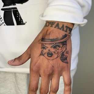 Hand tattoo by Soto Gang #SotoGang #handtattoo #payasa #clown #girl #portrait #hand #chicano #anime #tattoosondarkskin #darkskintattoos