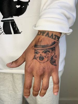 Hand tattoo by Soto Gang #SotoGang #handtattoo #payasa #clown #girl #portrait #hand #chicano #anime #tattoosondarkskin #darkskintattoos