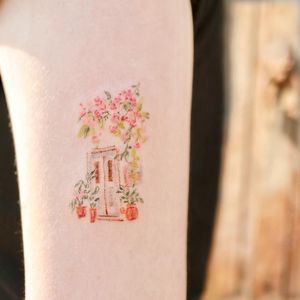 Illustrative watercolor tattoo by Ovenlee #Ovenlee #OvenleeTattoo #StudioBySol #watercolor #illustrative #colorpencil #sketch #cute #door #doorway #flowers #floral #stillife #plant #home #nature