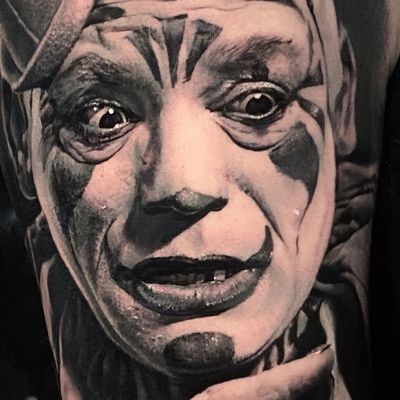 Clown tattoo by Thomas Carli Jarlier #ThomasCarliJarlier #blackandgrey #hyperrealism #realism #clown #joker #creepy #darkart #portrait