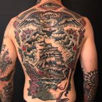 Back tattoo by Paul Dobleman #PaulDobleman #backtattoo #backpiece #tradiional #traditionaltattoo #eye #ship #ocean #eagle #mermaid #roses #anchor #clouds #compass #color