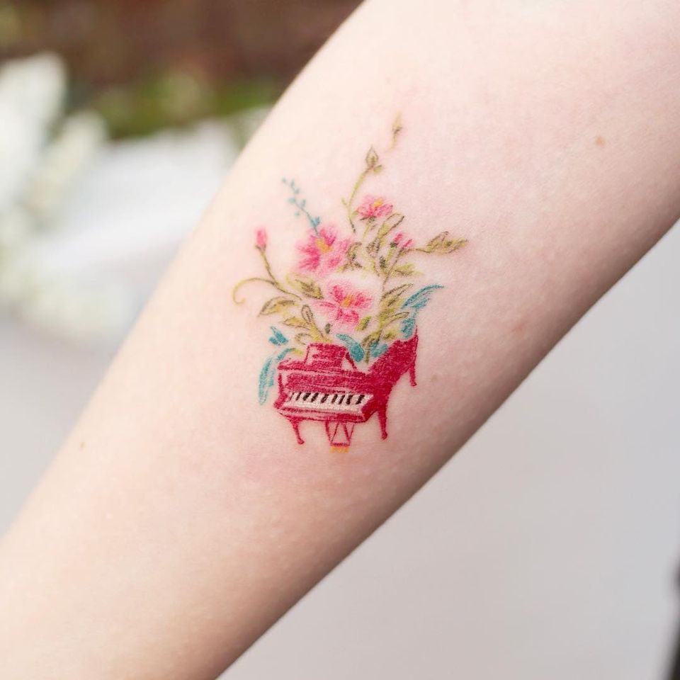 Illustrative watercolor tattoo by Ovenlee #Ovenlee #OvenleeTattoo #StudioBySol #watercolor #illustrative #colorpencil #sketch #cute #piano #music #flowers #floral #nature #plants