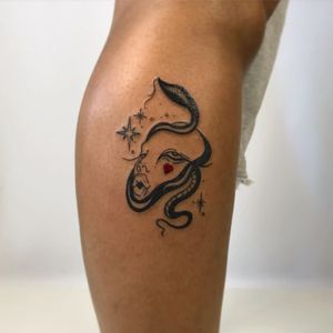 Surreal tattoo by Sanyu #Sanyu #portrait #sparkle #star #snake #tattoosondarkskin #darkskintattoos