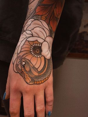 Hand tattoo by Chris Green #ChrisGreen #handtattoo #neotraditional #snake #peony #flower #floral #nature 