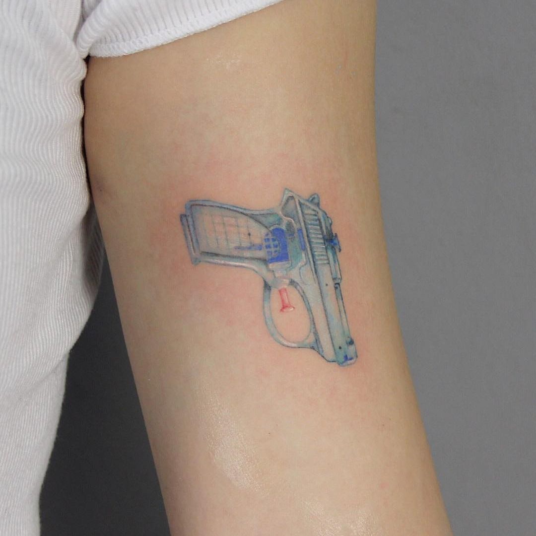 Pistol and Revolver Tattoo Designs - TatRing