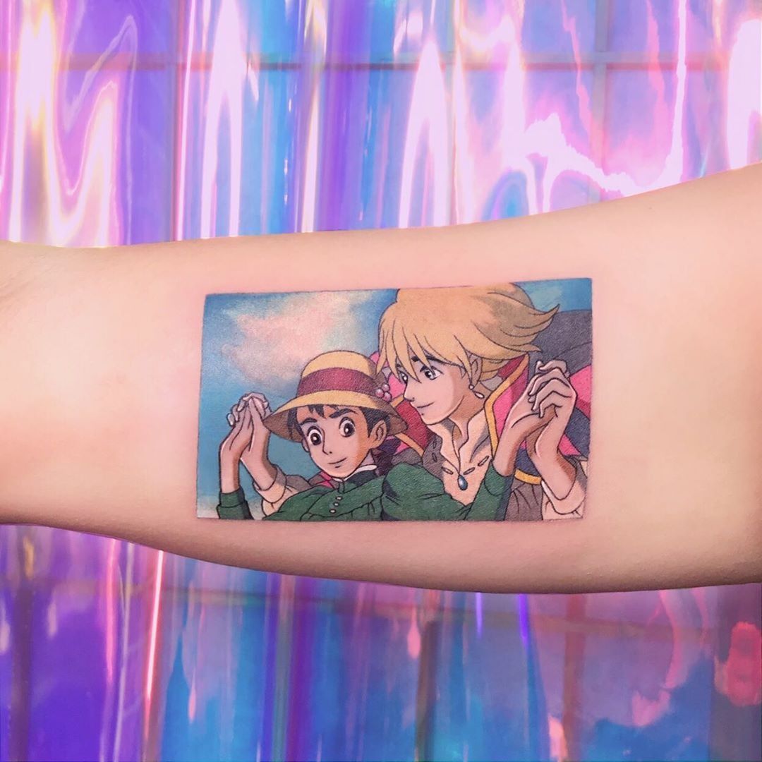 Howls Moving Castle tattoo on the inner forearm