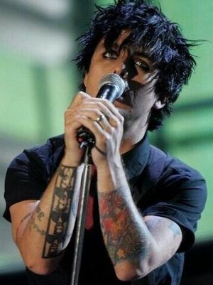 Billie Joe’s photo strip tattoo of wife Adrienne on the right arm #GreenDay #rockstartattoos #punkrock #BillieJoeArmstrong