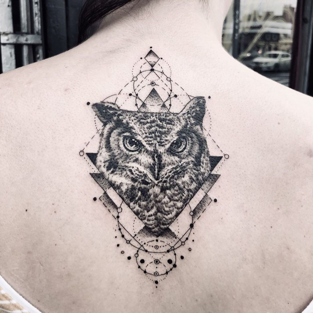Geometric/blackwork style owl tattoo on the left inner