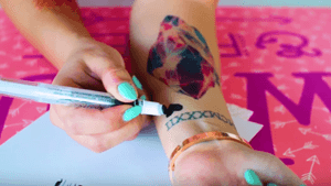 LaurDIY trying out Sports Marker tattoos on her YouTube channel. #temporarytattoo #temptattoo #DIYtattoo 